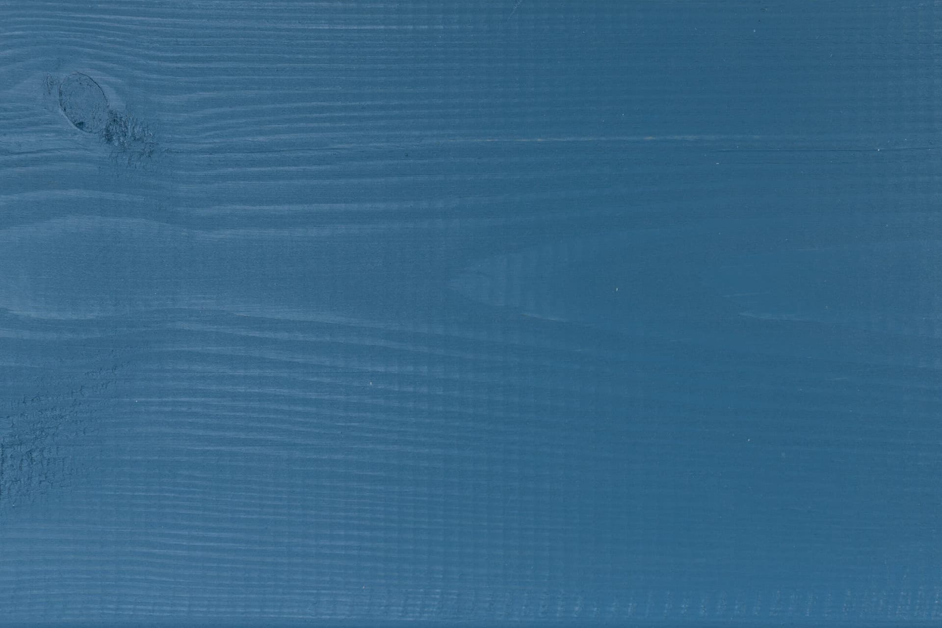 Aurora Blue colour swatch on wood